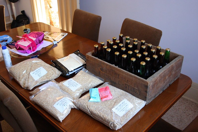 all grain homebrew kit with bottled homebrew on counter